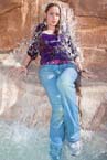 dripping wet jeans under waterfall