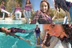 brunette girl in tight blue jeans swimming and diving in water