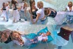 2 great girls swimming and playing in the water with jeans and skirt